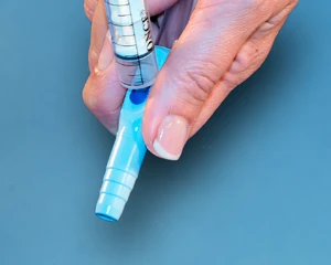 Sample port connectors for urine bag