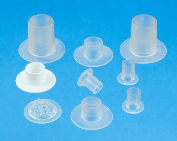 Tube flanges and breather eyelets